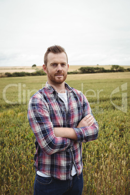 Agronomist using digital tablet in the field