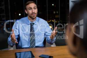 Businessman having a discussion in office