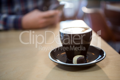 Cup of a coffee on the table