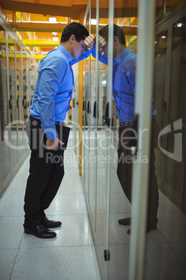 Technician getting stressed over server maintenance