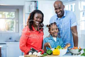 Happy family preparing food