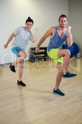 Portrait of two men doing aerobic exercise