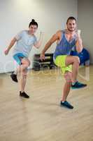 Portrait of two men doing aerobic exercise