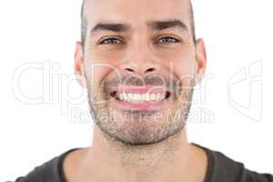 Man smiling against white background