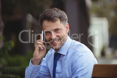 Businessman talking on mobile phone