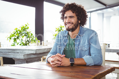 Man sitting and smiling