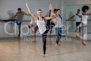 Woman performing stretching exercise