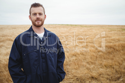Portrait of farmer standing in the field