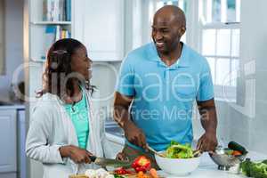 Couple preparing food