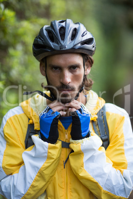 Male biker wearing bicycle helmet