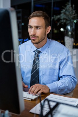 Business executive working on computer in office