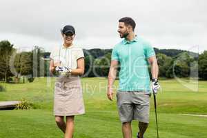 Couple interacting with each other while walking