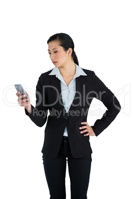 Businesswoman using mobile phone