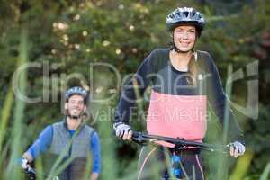 Biker couple cycling in countryside