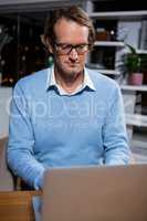 Businessman working on laptop