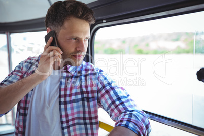 Handsome man talking on mobile phone