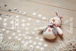 Snowman and christmas decoration on wooden table
