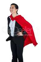 Woman pretending to be a super hero on white background