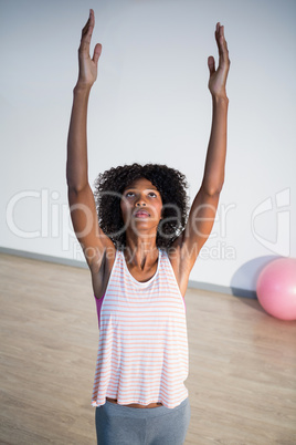 Woman performing stretching exercise Woman performing stretching exercise
