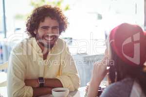 Portrait of smiling man having cup of coffee