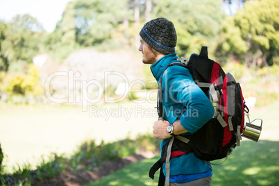 Hiker standing at countryside