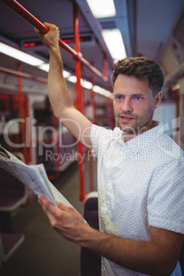 Handsome man listening music on mobile phone