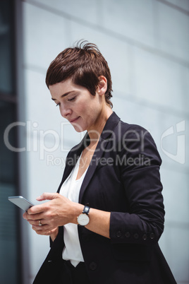 Businesswoman using mobile phone