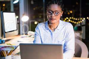 Businesswoman working on laptop