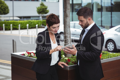 Businesspeople discussion on digital tablet