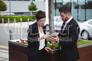 Businesspeople discussion on digital tablet