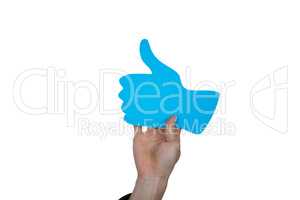 Hand of man holding thumbs up sign board