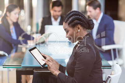 Businesswoman using digital tablet