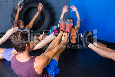 Athletes doing stretching exercise