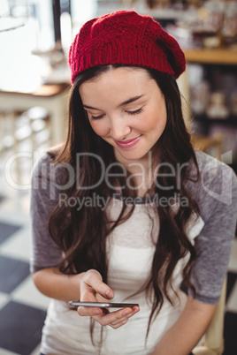 Smiling woman using mobile phone Smiling woman using mobile phone