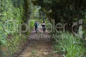 Biker couple cycling in countryside