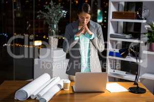 Frustrated businesswoman working in office