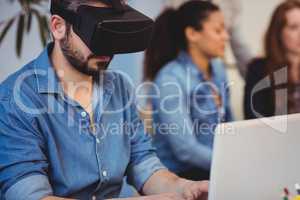 Businessman wearing virtual reality headset