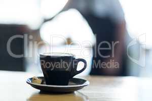 Cup of coffee on table