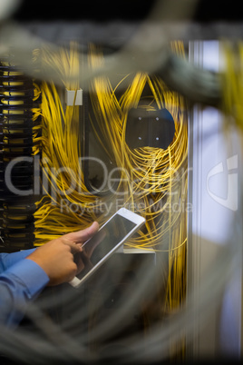 Technician using digital tablet