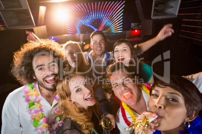 Group of friends having fun in bar