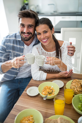 Portrait of couple having breakfast