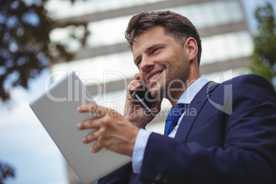 Businessman talking on mobile phone