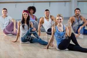 Group of people performing yoga