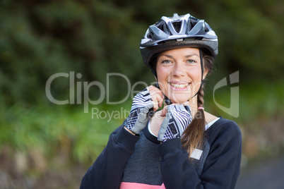 Female biker wearing bicycle helmet