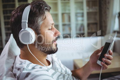 Man listening to music on headphones