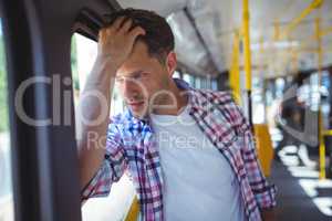 Handsome man travelling in bus