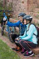 Biker couple taking selfie from mobile phone