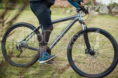 Male mountain biker riding bicycle