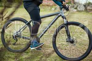 Male mountain biker riding bicycle