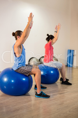 Men performing stretching exercise